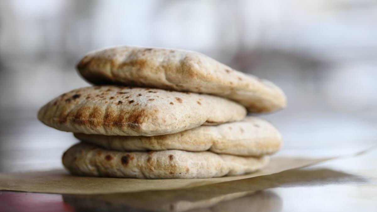 Hasiba's sourdough pita bread is proofed, shaped and baked in-house to order.