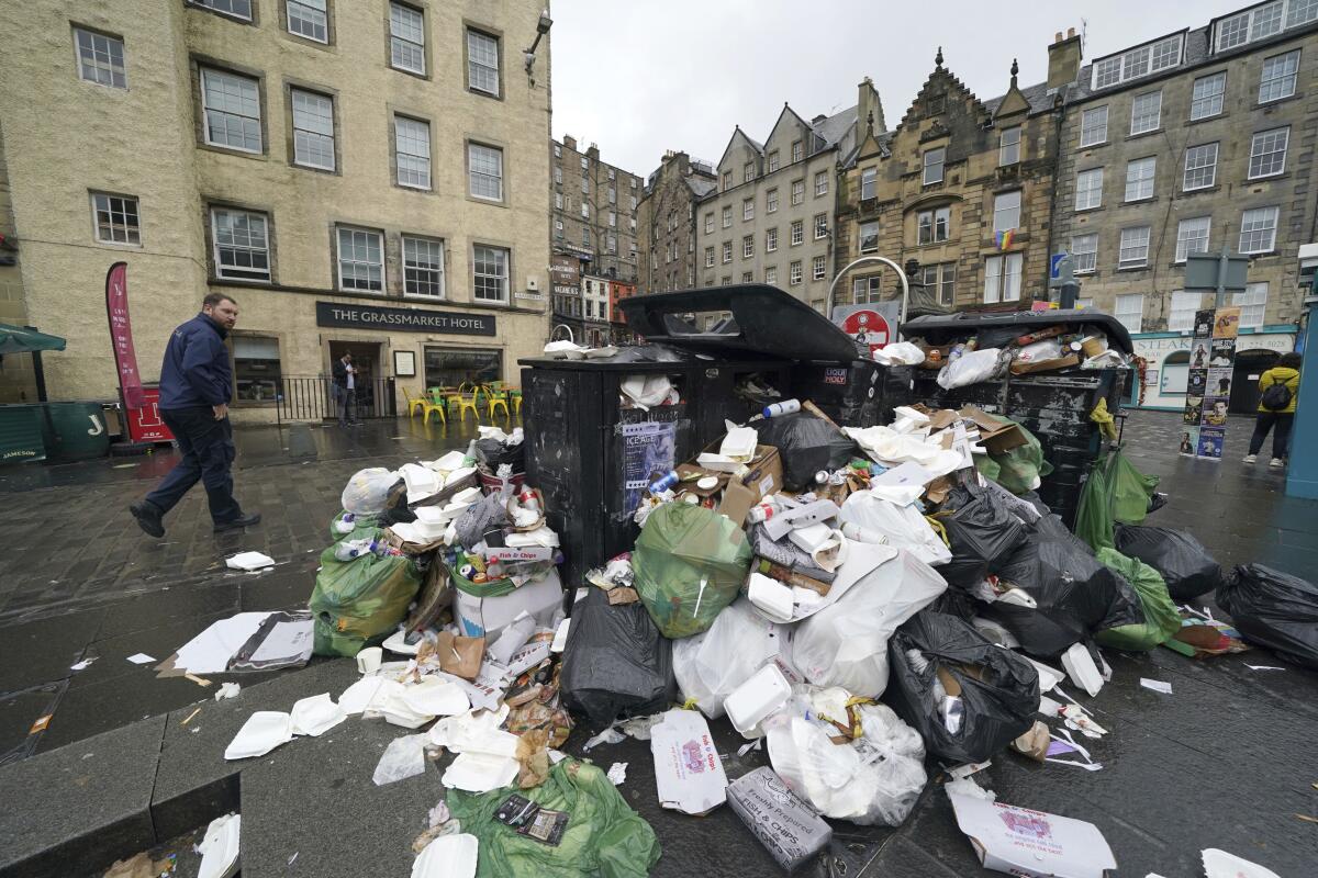Overflowing garbage bins in an urban area 