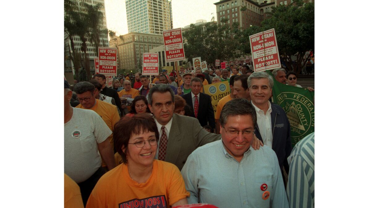 Miguel Contreras and Maria Elena Durazo at a protest in 1997.