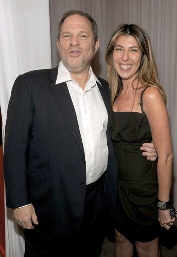 Producer Harvey Weinstein with Marie Claire fashion director and "Project Runway" judge Nina Garcia.