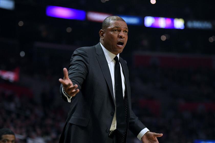 Clippers coach Doc Rivers argues a call on the sideline.