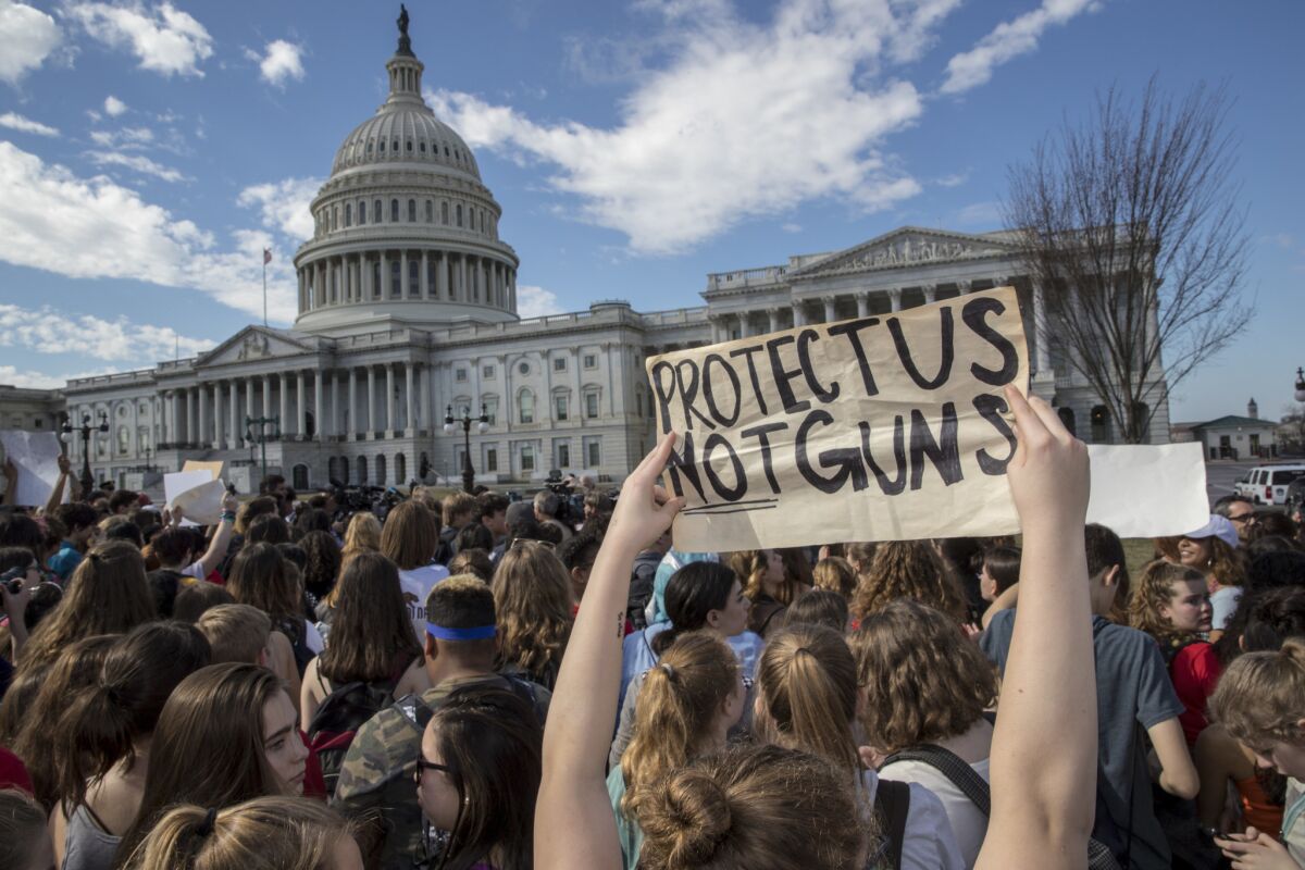 Students demonstrate in Washington for more gun control one week after the mass shooting at a high school in Parkland, Fla.