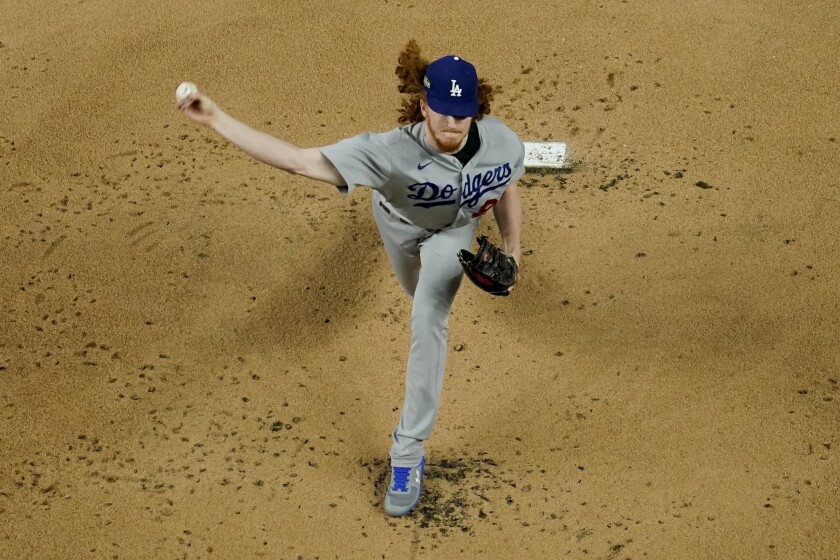 Dodgers starter Dustin May delivers in the first inning of Game 5 of the NLCS.