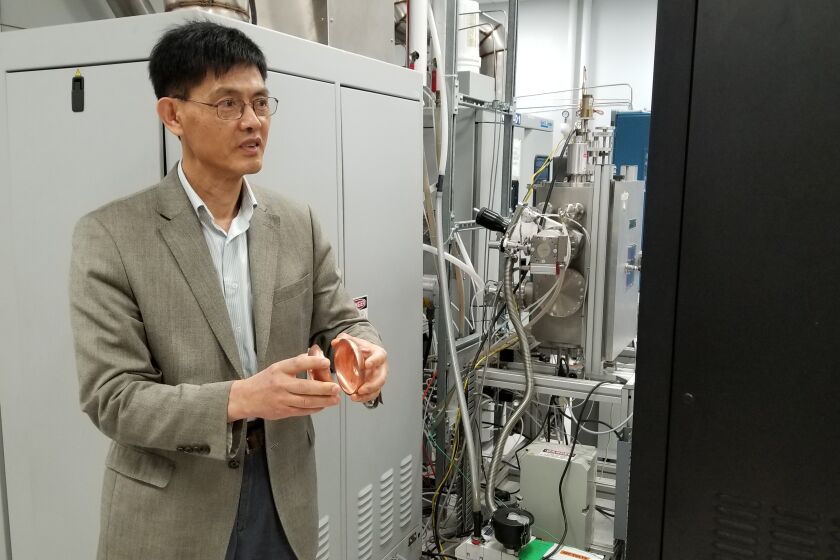 Xiaoxing Xi, a Temple University physics professor, works with superconducting thin film in his lab. He is suing the federal government, which alleged in 2015 that he illegally sent technical information to China only to drop the charges four month later.