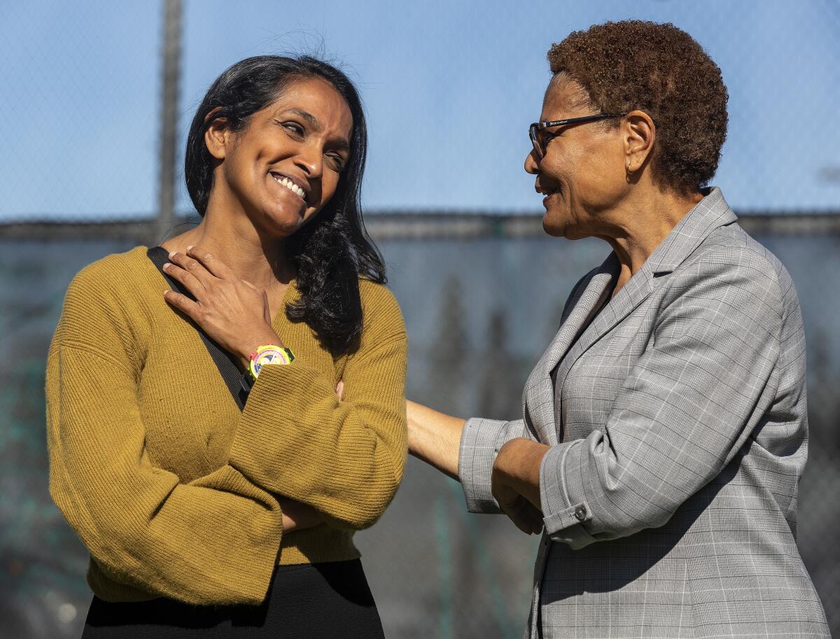 SHERMAN OAKS, CA-February 10, 2024:Los Angeles City Councilmember Nithya Raman, left, talks with Mayor Karen Bass at Hazeltine Park in Sherman Oaks where supporters gathered before heading out for a door to door canvas. Raman is facing a vigorous challenge from deputy city attorney Ethan Weaver and the mayor is campaigning for her. (Mel Melcon / Los Angeles Times)