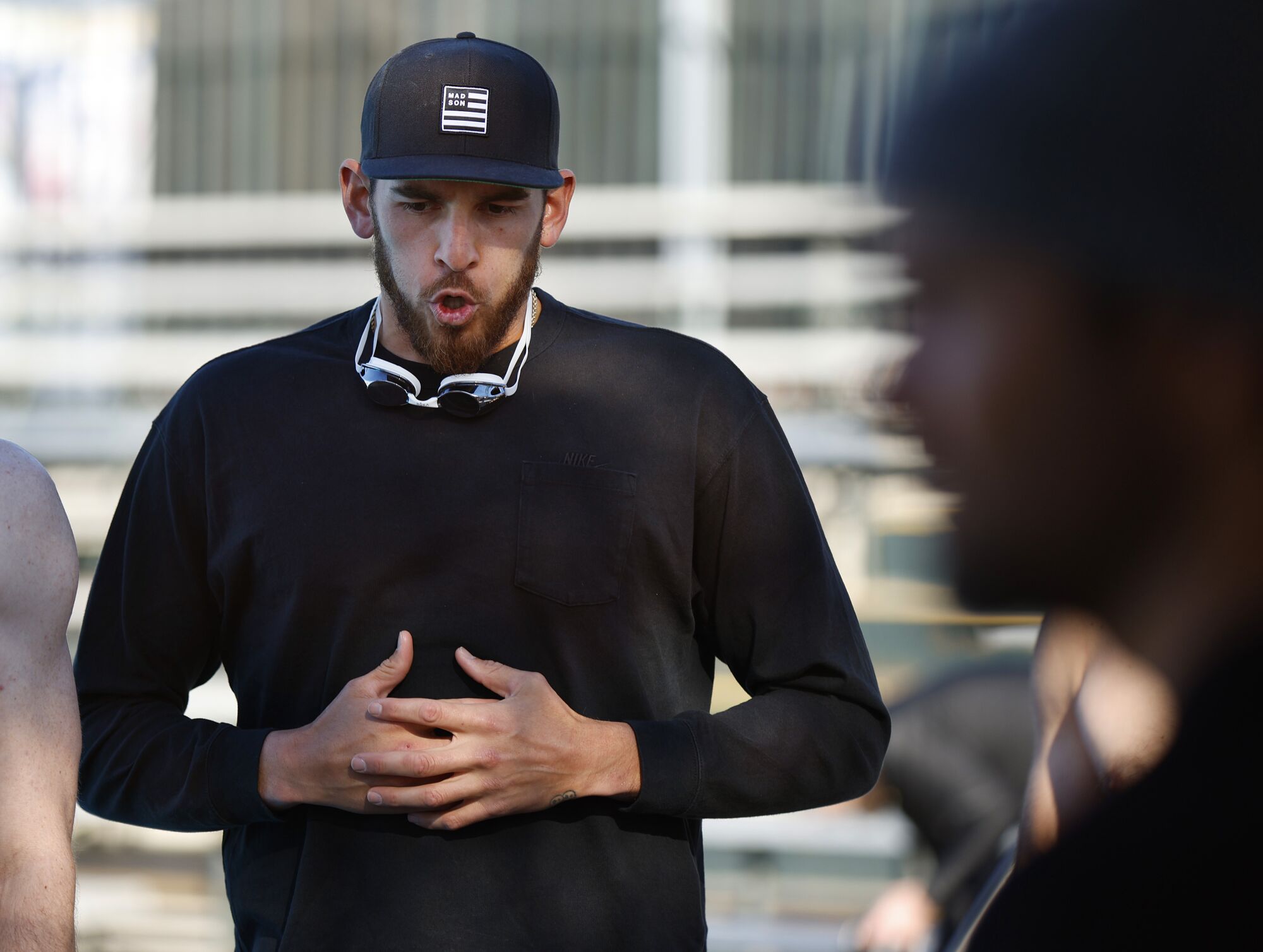 Joe Musgrove does breathing exercises with Padres teammates while training with Deep End Fitness.