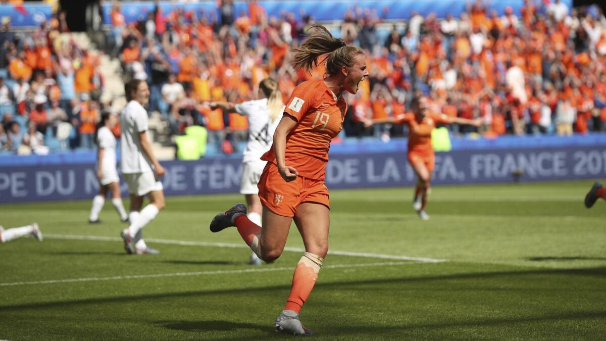 Jill Roord celebrates after scoring in stoppage time to lift the Netherlands to a 1-0 victory over New Zealand in Women's World Cup group play on June 11.