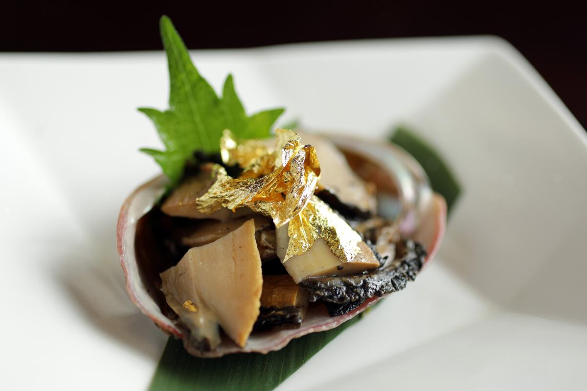 Abalone sashimi with gold leaf at Go's Mart in Canoga Park, serving some of the best seafood in the L.A. area.