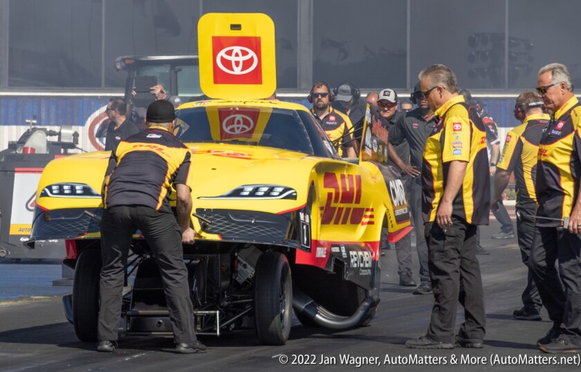 This is how funny cars raise their hood