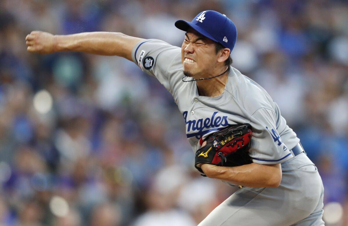 Dodgers starter Kenta Maeda delivers against the Colorado Rockies during Monday's 9-1 loss.