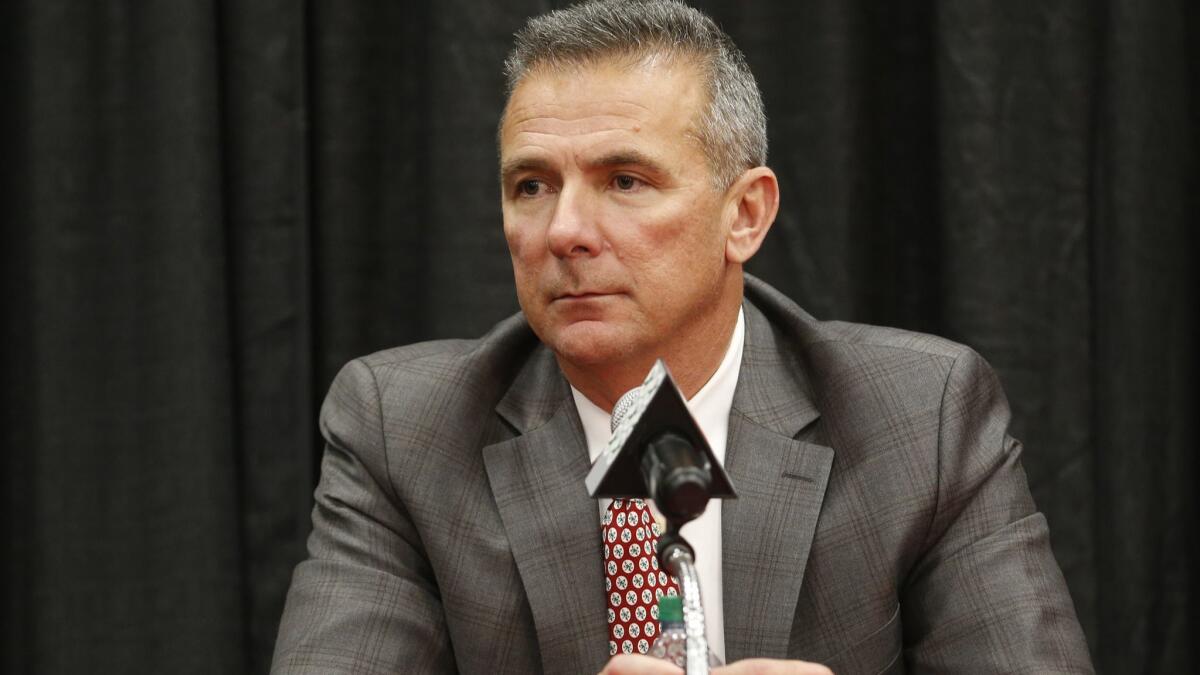 Ohio State coach Urban Meyer answers questions during a news conference announcing his retirement on Tuesday in Columbus, Ohio.