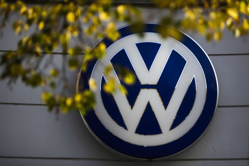 The Volkswagen logo is displayed at a dealership in Berlin on Oct. 5, 2015.