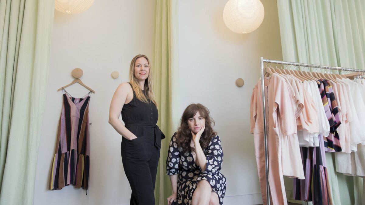 Laura Cramer, left, and Starr Hout, owners of the New York-based clothing label Apiece Apart, at their pop-up boutique on Lincoln Boulevard in Venice.