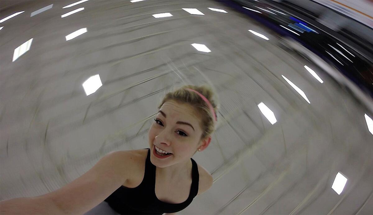 Gracie Gold, two-time U.S. national figure skating champion, takes a photo while practicing her tilted spin move at the Toyota Sports Center on Feb. 3, 2016.