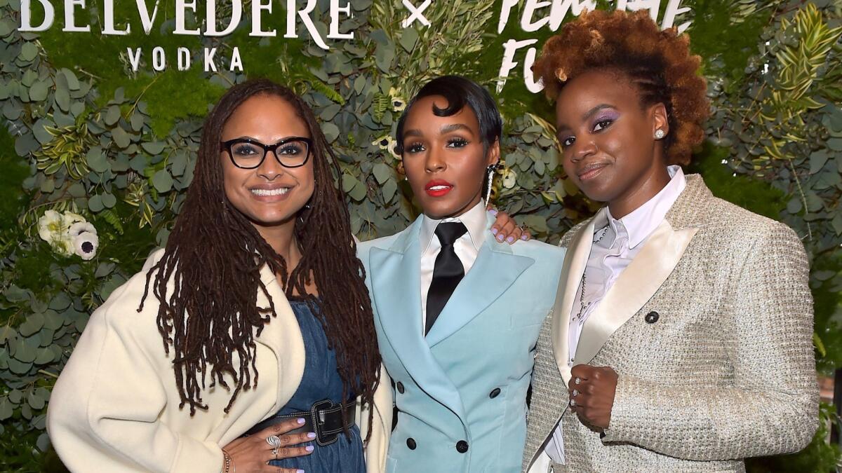 Ava DuVernay, left, Janelle Monáe and Dee Rees attend the Fem the Future brunch in L.A.