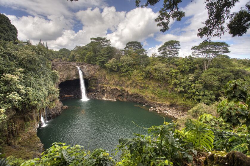 Hawaii can be expensive, but there are plenty of ways to economize. Much of the islands' natural beauty can be seen for free or a small entrance fee. Rainbow Falls is just outside Hilo on Hawaii Island.