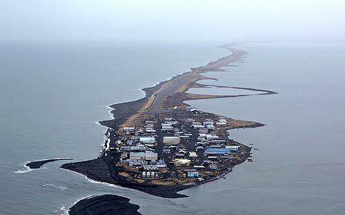 The Alaskan island of Kivalina looks like a giant tadpole from the air, with the Chukchi Sea to the left steadily lapping up the shoreline. Many believe global warming is taking its toll on the island and though there have been talks over the years of relocating its 400 residents, squabbles and uncertainty have derailed any long-term plans.