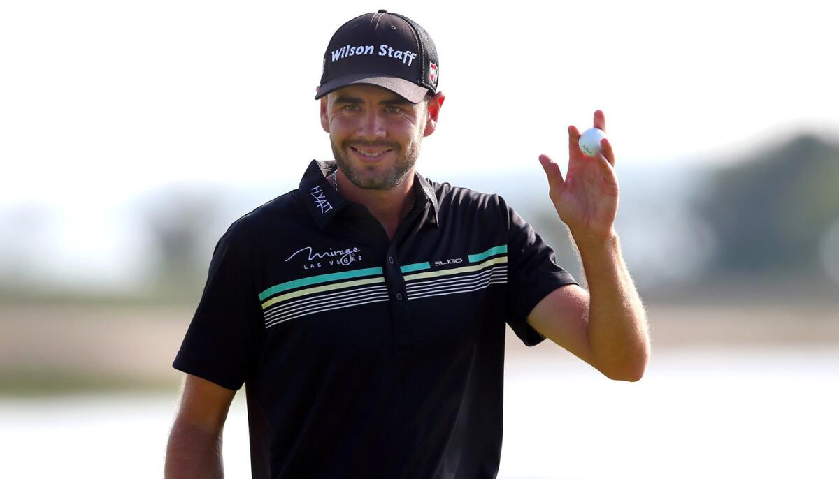 Troy Merritt waves to the fans after completing his third round of the RBC Heritage at Harbour Town Golf Links on Saturday.