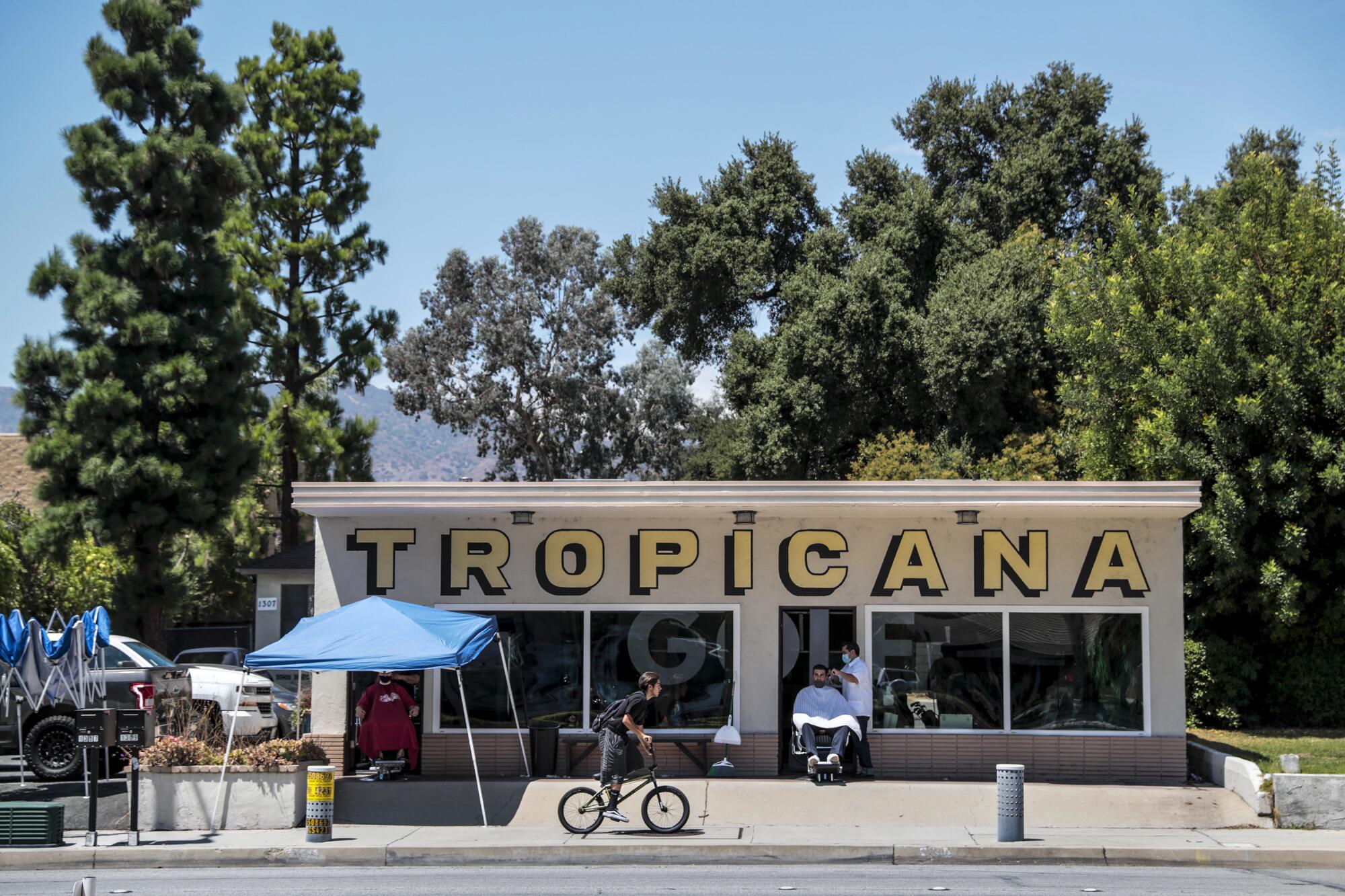 Haircuts on the sidewalk in Glendora