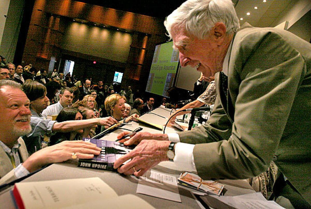 John Updike greets fans at the 2006 BookExpo in Washington, D.C. 