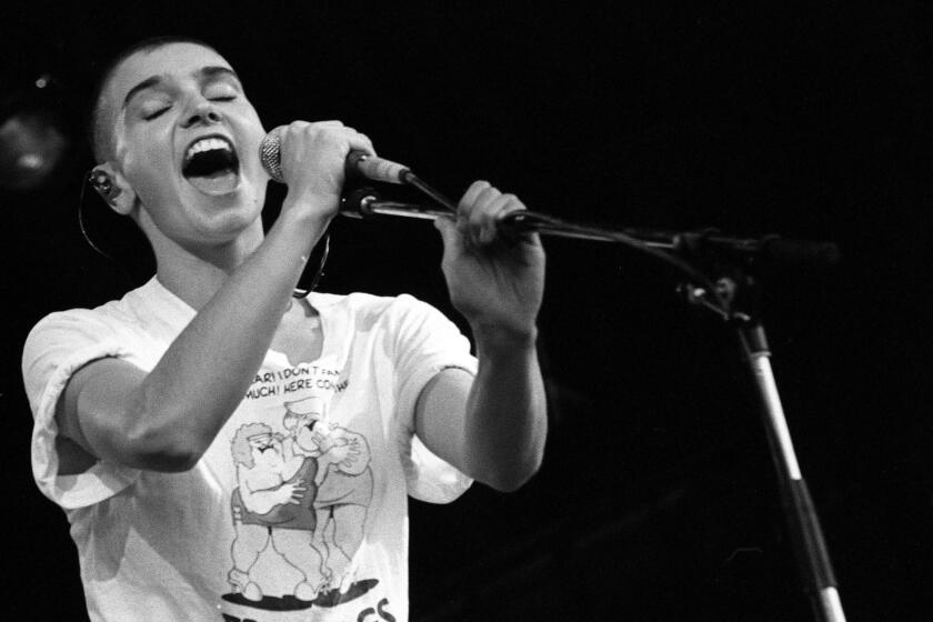 Sinead O'Connor performs on stage at Glastonbury , United Kingdom, 1990. (Photo by Martyn Goodacre/Getty Images)