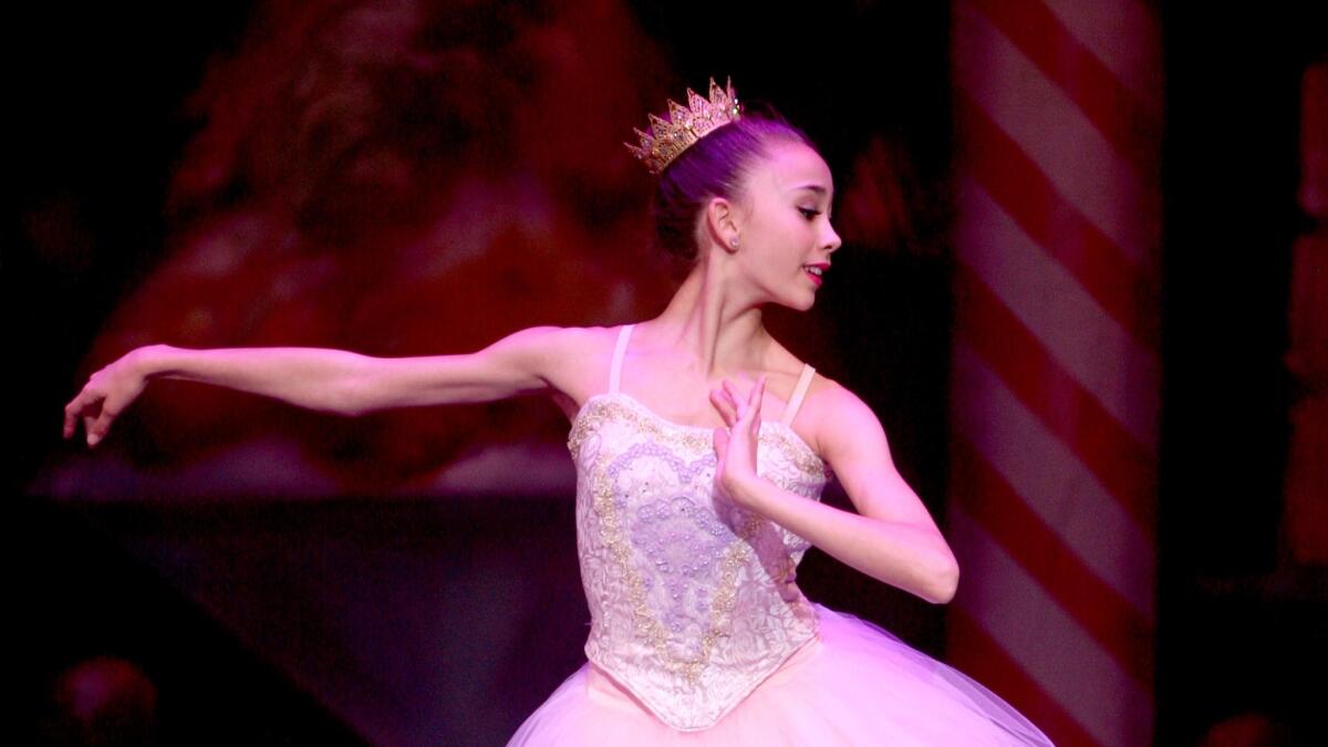 Lena Harris performs as the Sugar Plum Fairy in "The Nutcracker," put on by the Red Chair Children's Production Company, at the Alex Theatre in Glendale on Friday, Dec. 11, 2015. Harris, a student at Burbank High, is one of six students from Burbank to be named a semifinalist in the Music Center's 28th annual Spotlight competition.