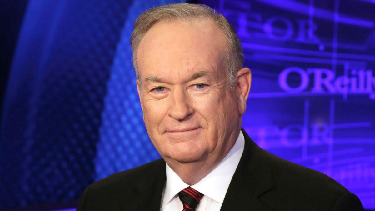 Bill O'Reilly is shown in 2015 on the set of his former Fox News show, "The O'Reilly Factor."