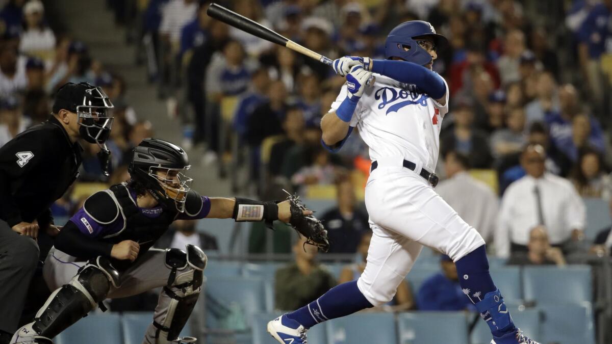 The Dodgers' Matt Beaty hits a walk-off two-run home run against the Colorado Rockies during the ninth inning on Friday at Dodger Stadium.