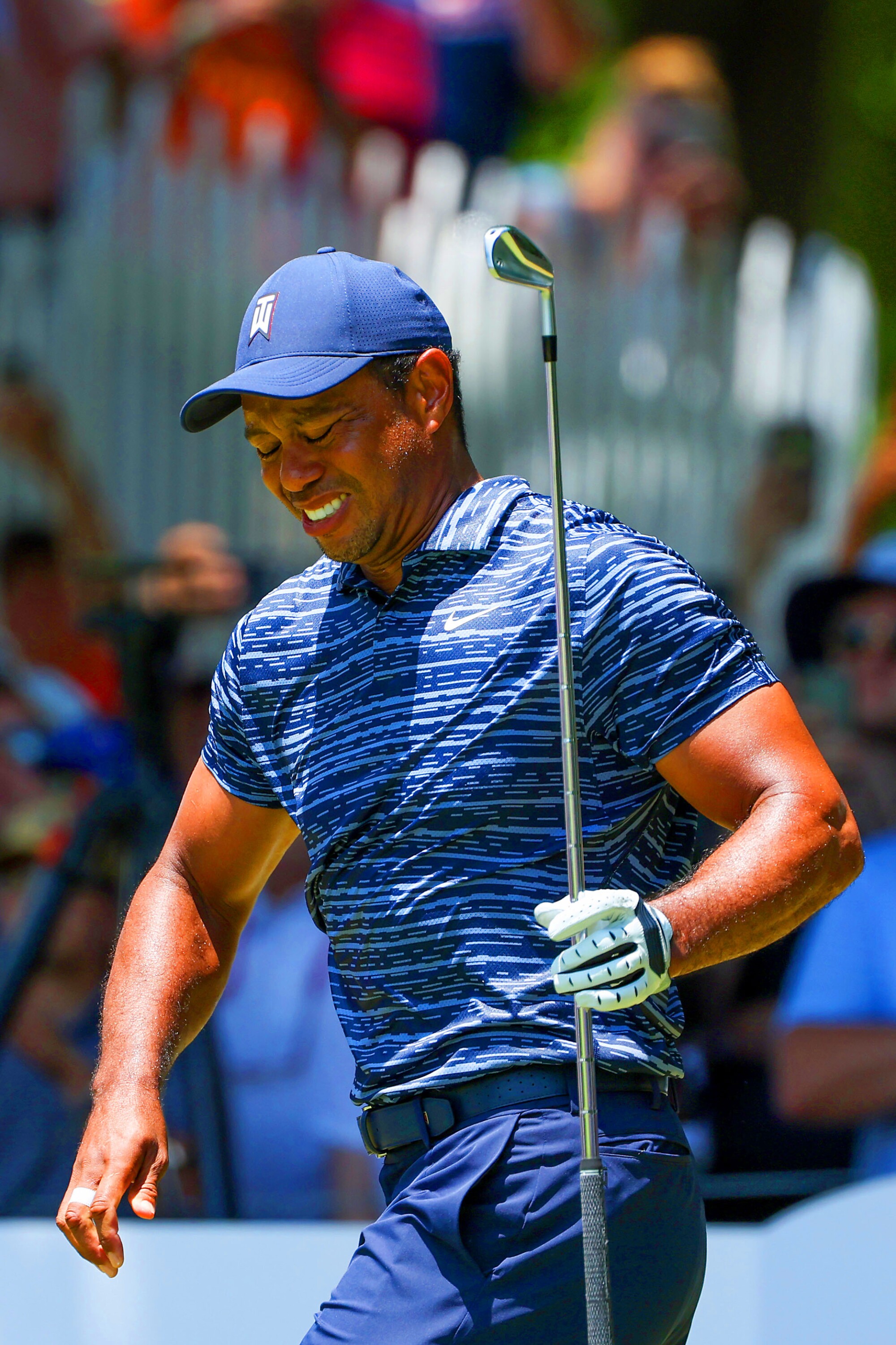 Tiger Woods reacts after his shot from the eighth tee in the first round of the 2022 PGA Championship