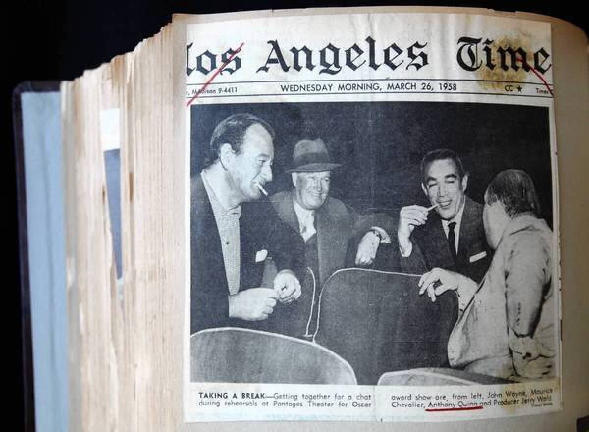 The front page of the Los Angeles Times from March 26, 1958, has a photo of John Wayne and Anthony Quinn; it is part of Quinn's personal archives at the Anthony Quinn Public Library in East Los Angeles.