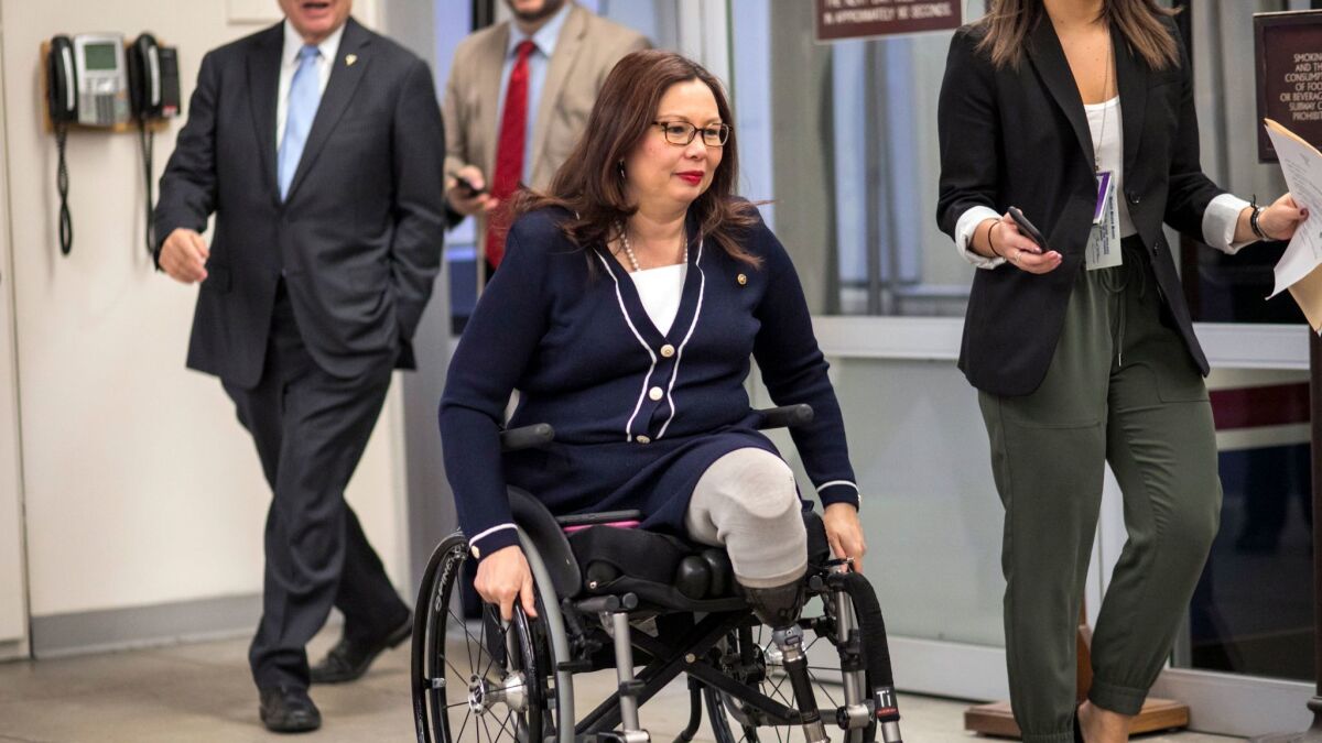 Sen. Tammy Duckworth (D-Ill.) arrives for a vote at the Capitol last month.