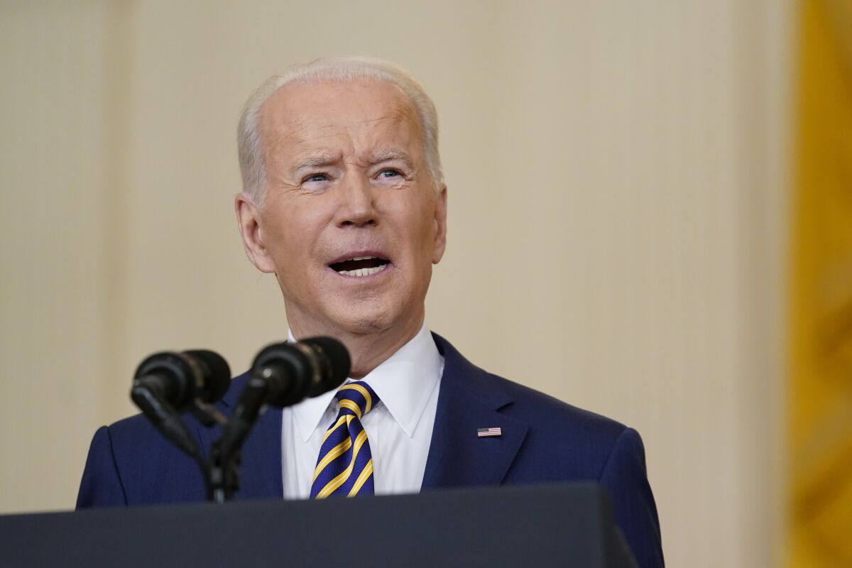 President Joe Biden speaks to the media after meeting privately with Senate Democrats on Thursday.