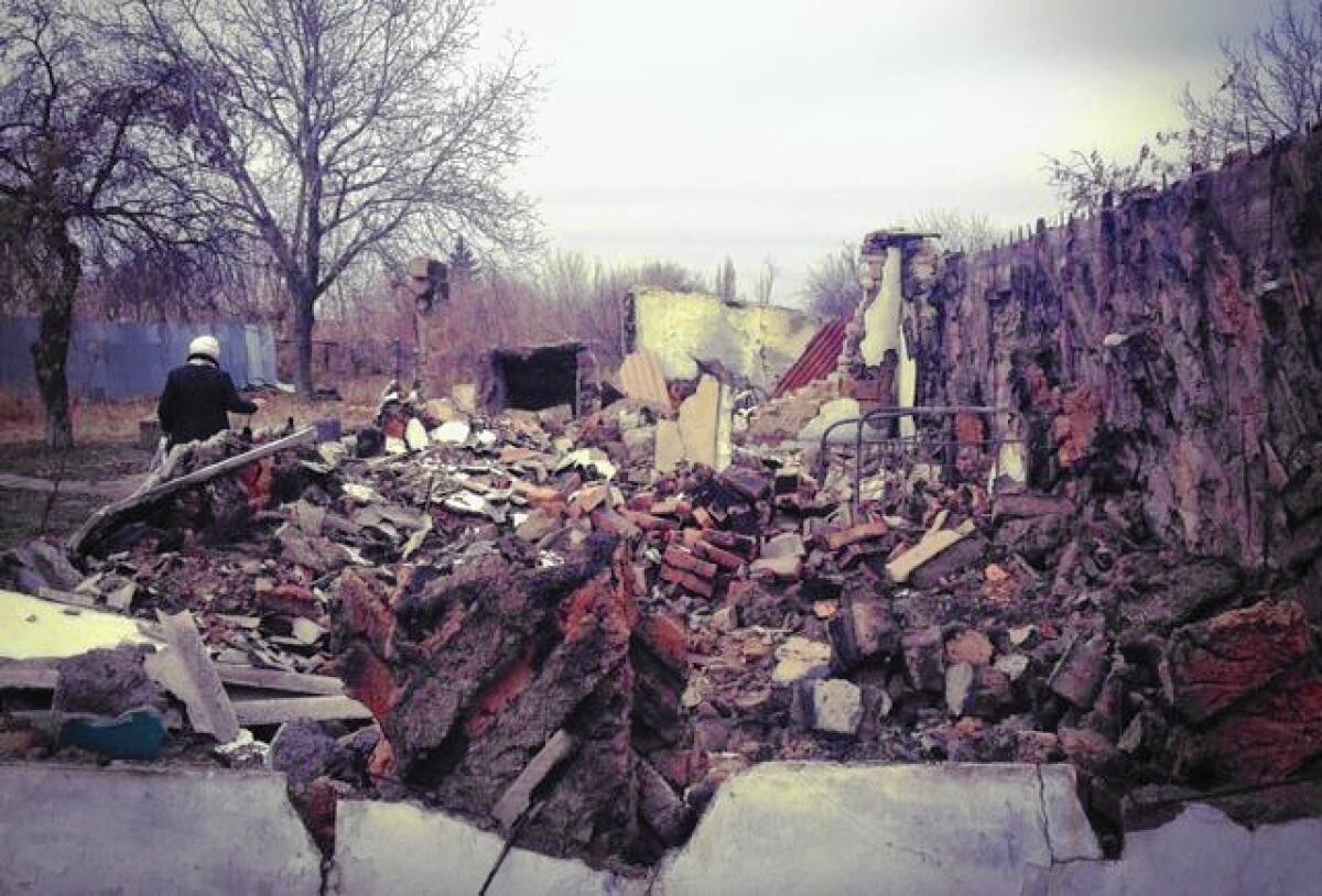 An artillery shell that ripped through her home in eastern Ukraine in mid-August left Luda Nesterenko, left, with rubble. In a split second, her life savings were reduced to its foundation.