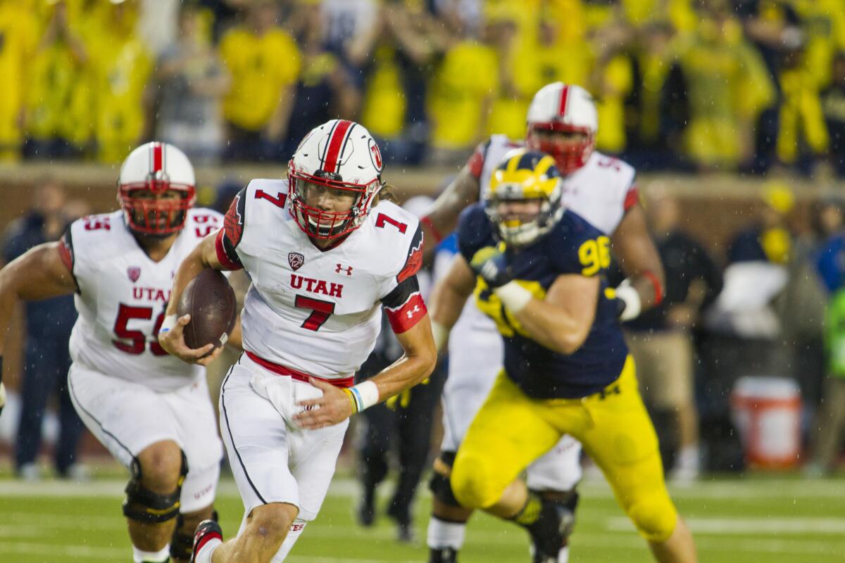 Utah quarterback Travis Wilson completed 14 of 20 for 172 yards, although he was shaken up after a scary play in the second quarter.