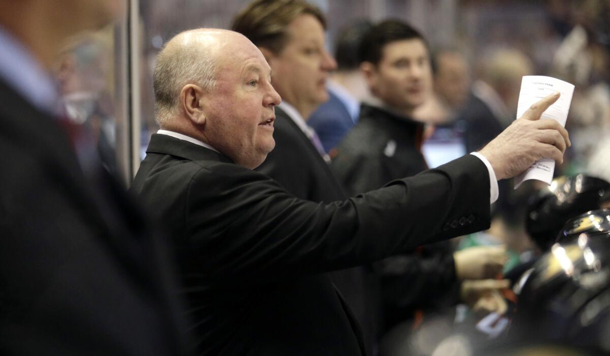 Coach Bruce Boudreau directs the Ducks during a game against the Dallas Stars on April 8 in Anaheim.