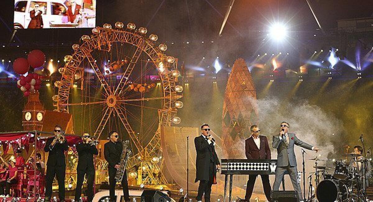 Madness performs at the London 2012 Olympics closing ceremony at Olympic Stadium.