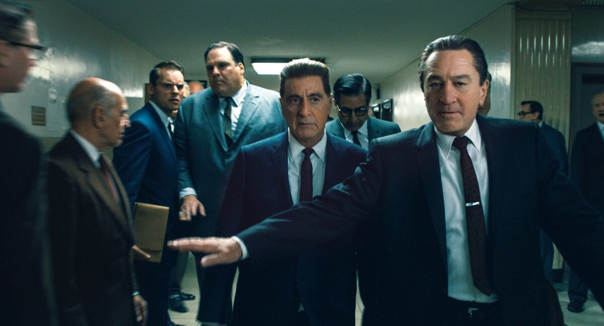 Robert DeNiro, right, and Al Pacino, center, in "The Irishman"