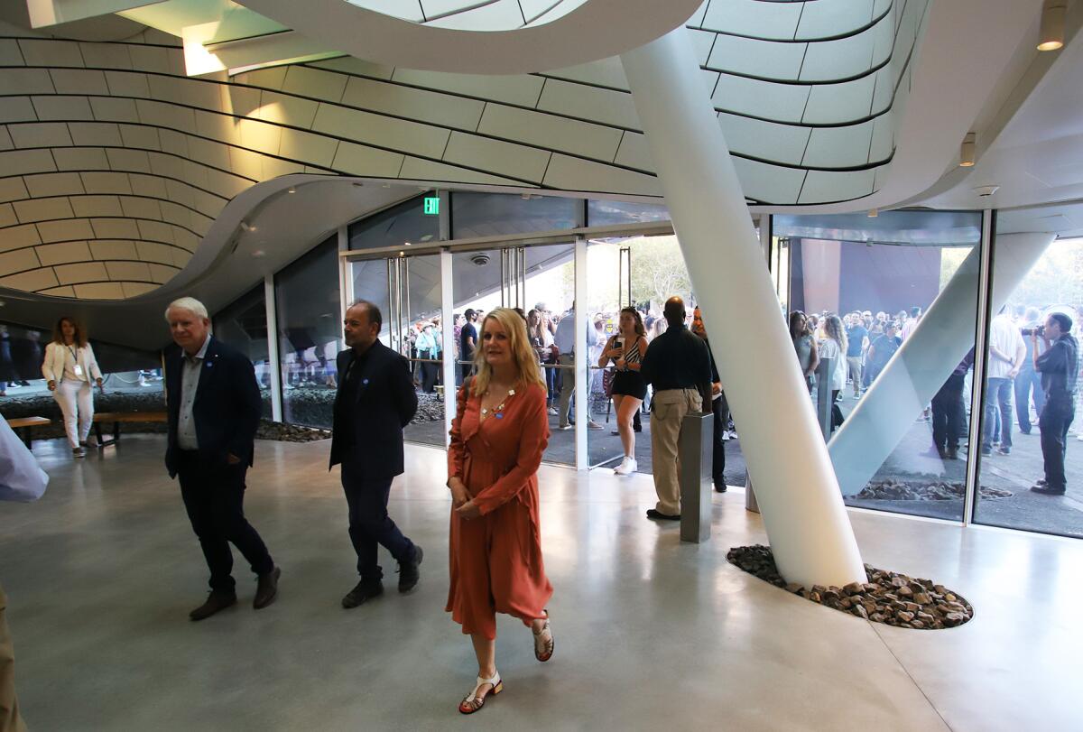 The first guests enter for the opening night ceremonies of OCMA in Costa Mesa's Segerstrom Center for the Arts on Oct. 8. 