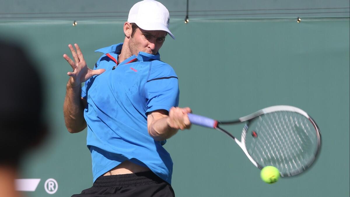 Bradley Klahn, shown running down a forehand at last year's Oracle Challenger Series event at the Newport Beach Tennis Club, plans to return in 2019.