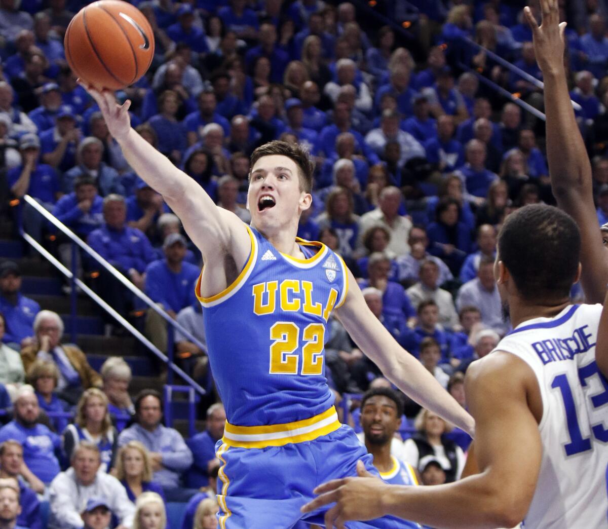 UCLA's TJ Leaf shoots near Kentucky's Isaiah Briscoe during the second half on Dec. 3.