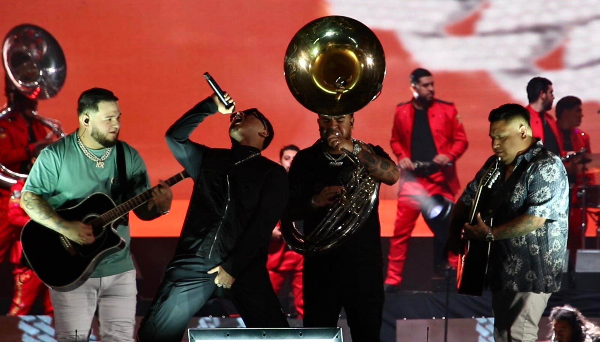 Band performa on stage at BMO Stadium in Los Angeles