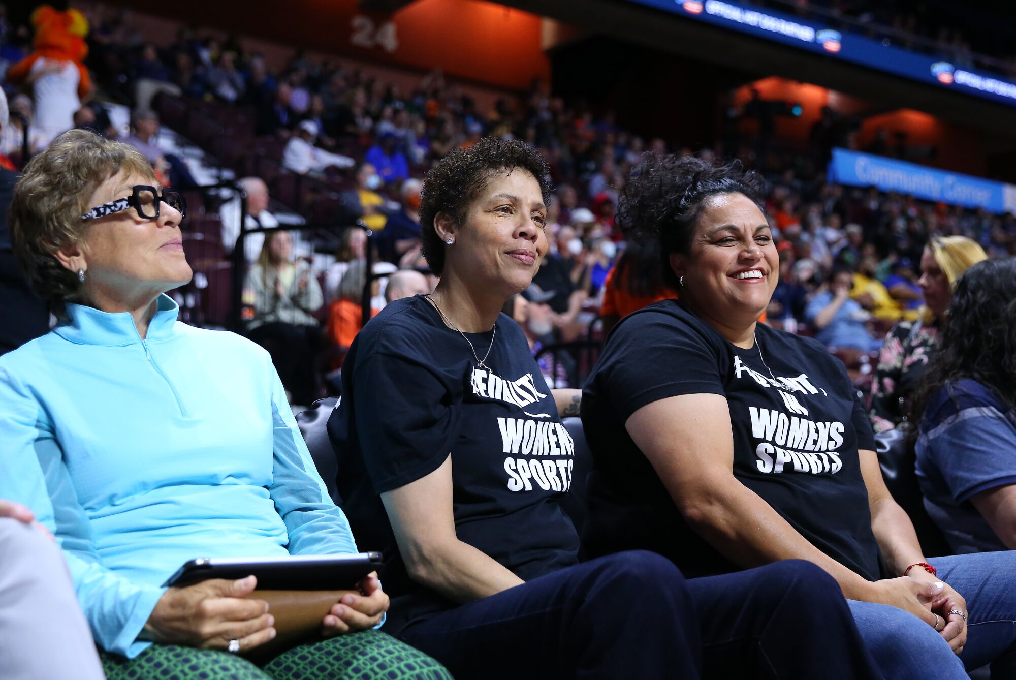 Former WNBA coach Cheryl Miller sits next to Riverside Community College women's basketball coach Alicia Berber.