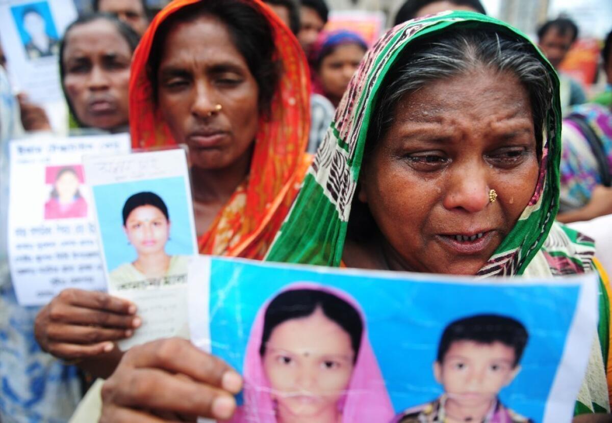 A Bangladeshi woman cries for her lost relatives in a protest after a factory collapse killed more than 1,100 people.