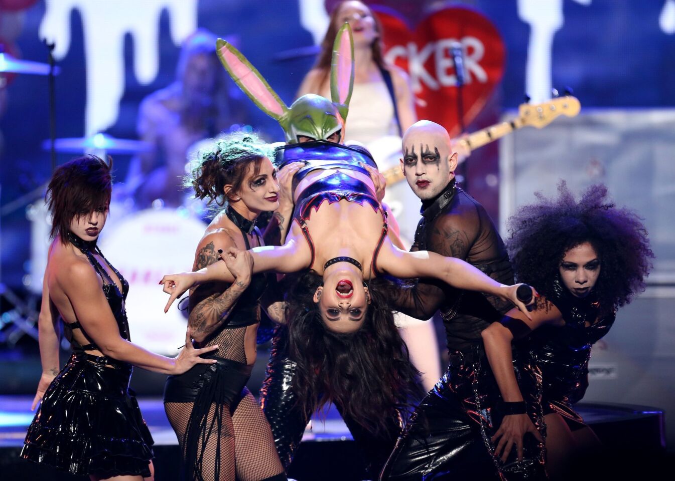 Charli XCX performs with her dancers.