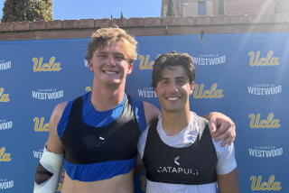 Linebacker Scott Taylor (left) and receiver Shane Rosenthal, graduates of Loyola and Newbury Park.