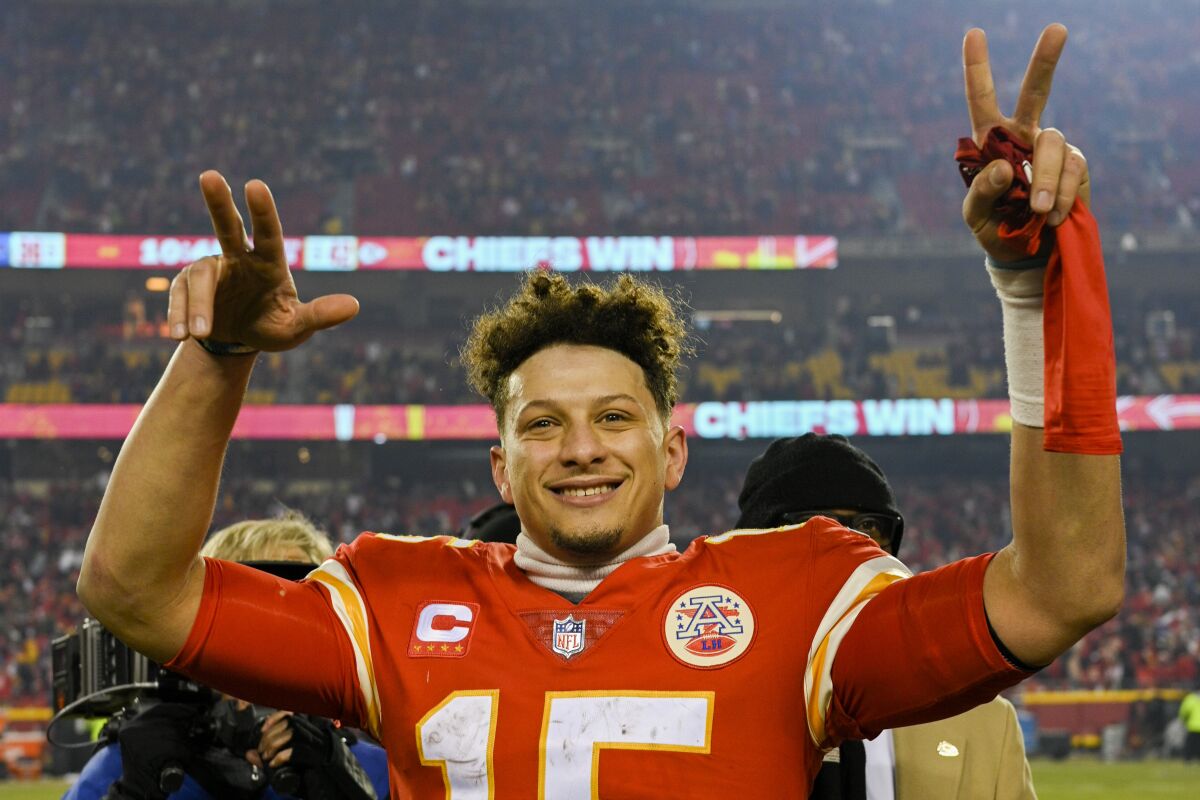 Kansas City Chiefs quarterback Patrick Mahomes celebrates after defeating the Buffalo Bills in overtime.