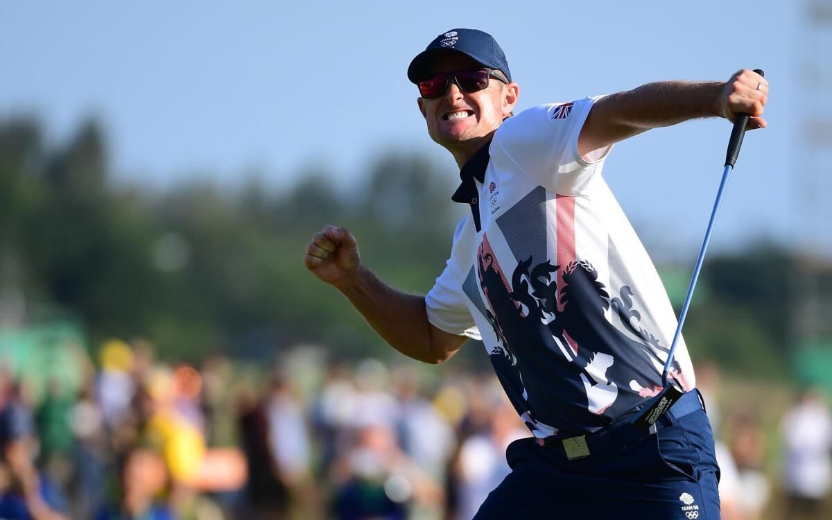 Great Britain's Justin Rose celebrates his victory at the Olympic golf course during the Rio de Janeiro Games on Sunday.