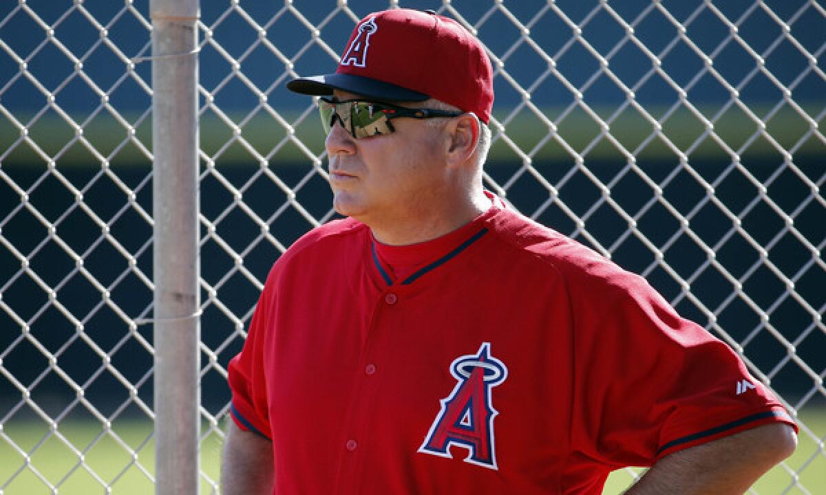 Angels Manager Mike Scioscia looks on during a spring training practice session on Feb. 15. Scioscia says umpires will benefit from better instant replay camera-angle accessibility once the regular season starts.