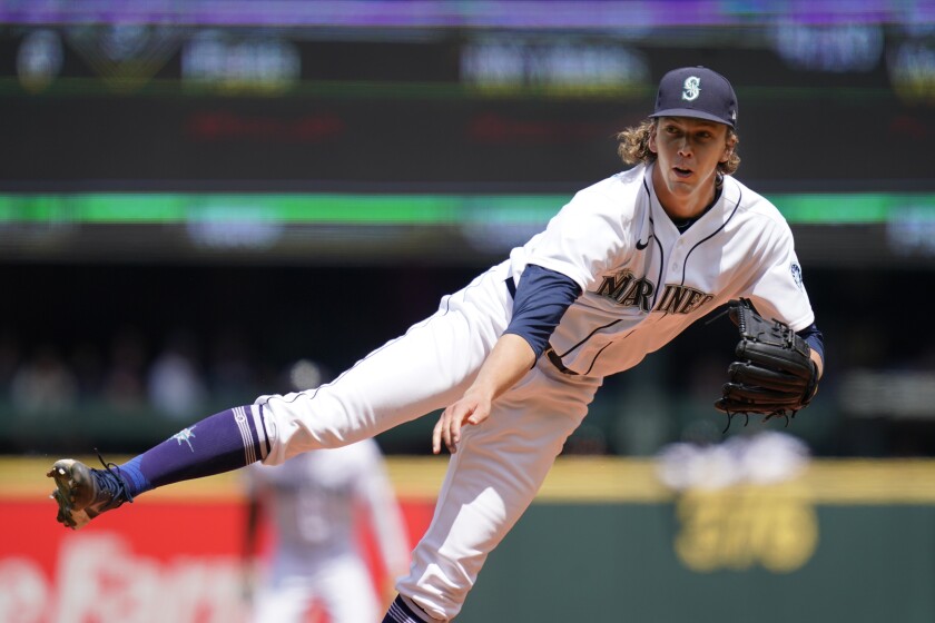 Seattle Mariners starting pitcher Logan Gilbert follows through on a pitch against the New York Yankees in the second inning of a baseball game Thursday, July 8, 2021, in Seattle. (AP Photo/Elaine Thompson)