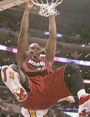 Shaquille O'Neal dunks